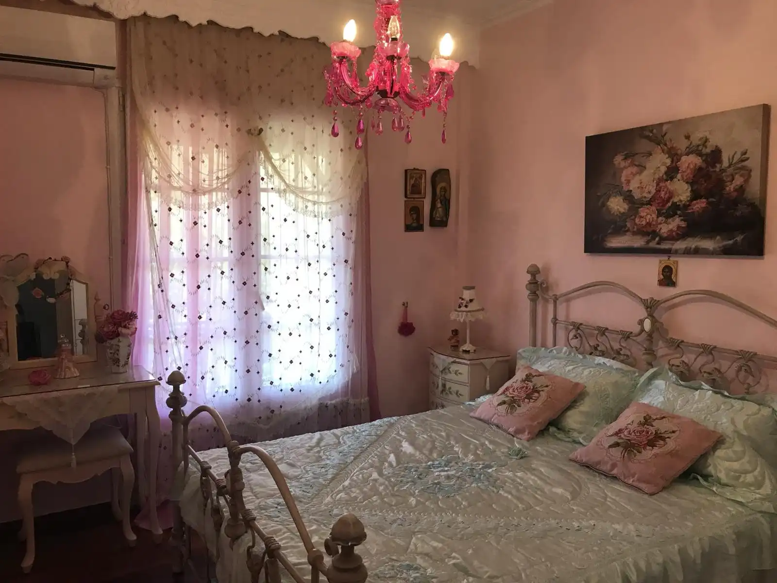 Cozy bedroom decor in a summer house with rustic and minimal style.
