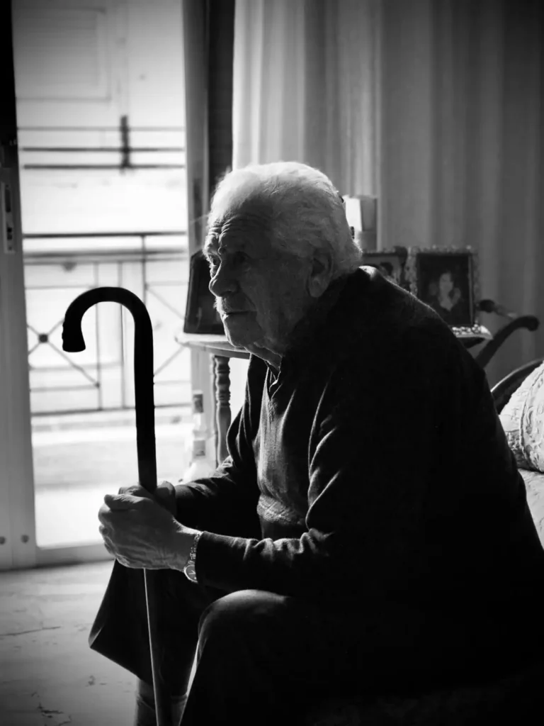 Black and white portrait of an ederly man.