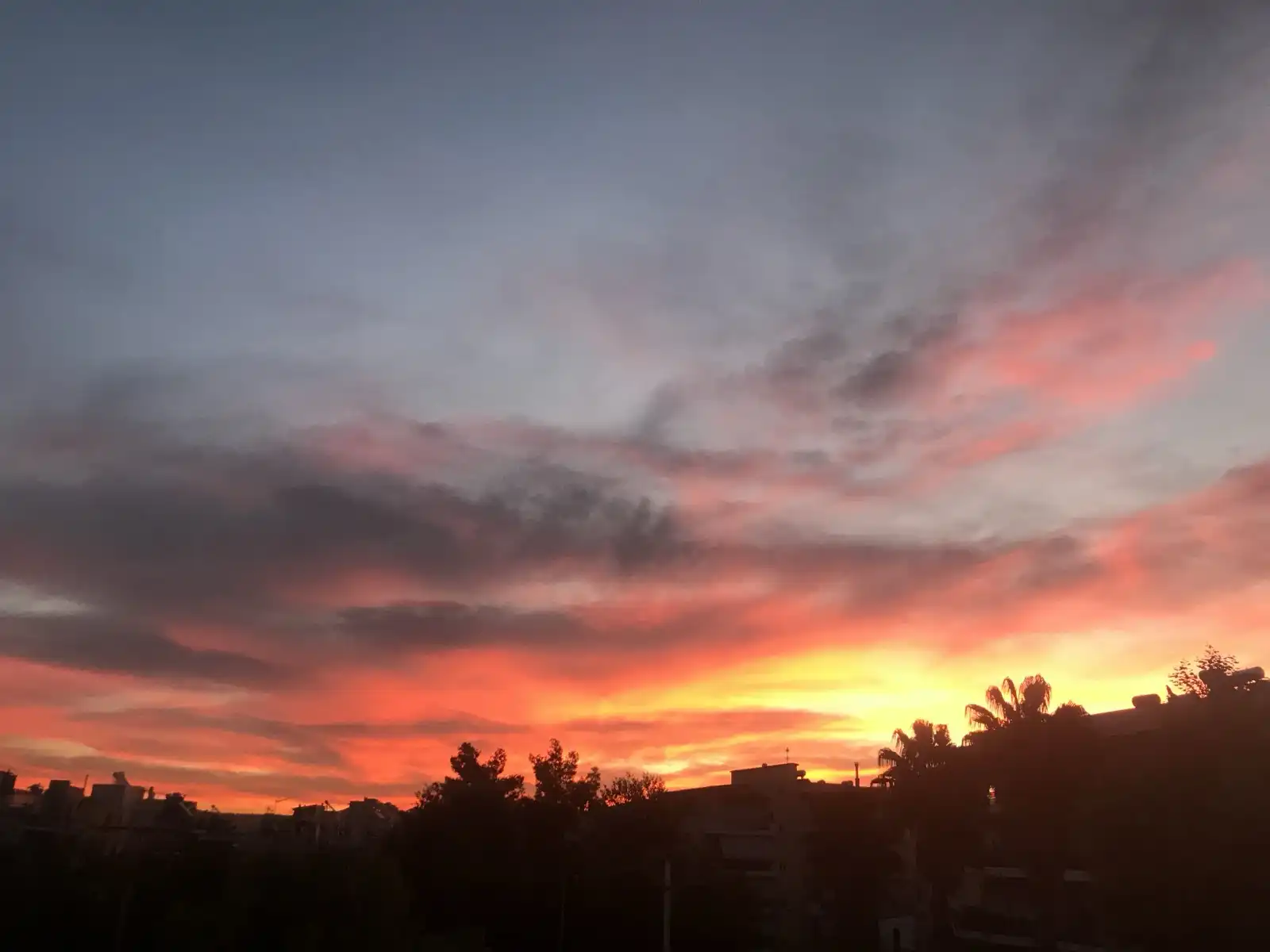 Sunrize with a colorful sky featuring shades of pink, orange, and purple.